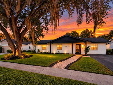 Photo of 6640 Winding Oak Drive, Tampa, FL 33625 (MLS # TB8562152)