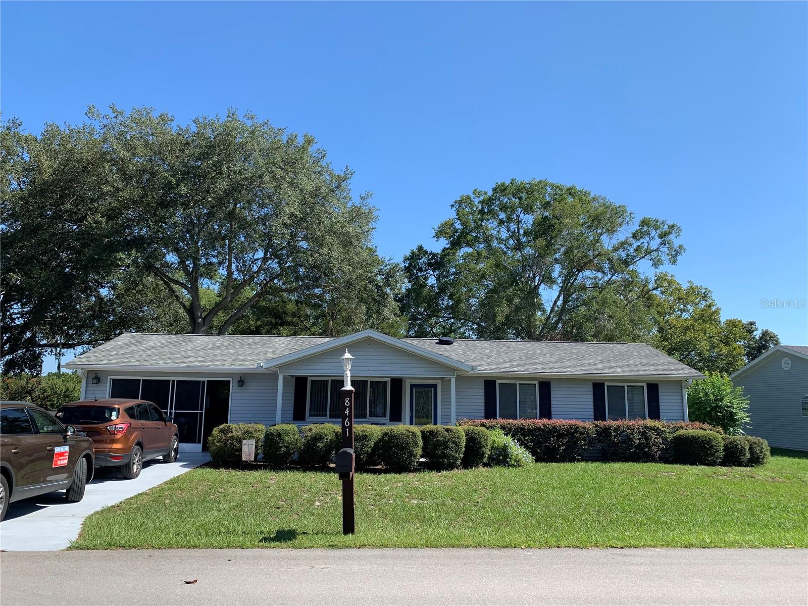 Lovely 2 bedroom, 2 bath move in ready home located in 55+ Oak Run, Ocala FL. This home has approx 1,200+ sq ft of living which includes a den bonus room off the kitchen. Wonderful neighborhood and neighbors this could be your snowbird nest or year round home. Roof replaced 2020, HVAC 2024, Electrical panel updated 2022, washer replaced 3 years ago. Solar tube in kitchen area makes it extra light and bright. Patio paver outside the lanai makes a great entertainment space and BBQ area. The house sits up on hill overlooking Oak Run Blvd. Quite and peaceful setting. Bonus, also offers a covered front porch that can easily accommodate your rocking chairs! Come be a kid again and enjoy all that Oak Run offers, 6 pools, 1 heated indoor, 5 hot tubs, 3 club houses, library, card rooms, onsite restaurant, 18 hole golf course, over 100 clubs to join. The list goes on and on. You can be as busy as you want, or not. Get yourself a golf cart and drive around the beautiful community and engage with your neighbors. Give a call today and take your private tour.