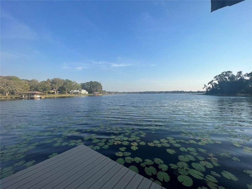 Under contract-accepting backup offers. DREAMY is the first word that comes to mind when you walk onto this gorgeous 13.32 acre LAKE FRONT property. This gem is awaiting your custom home plans! Situated on a 114 acre lake known as Lake Calm, this property embodies serene privacy, while not giving up a short commute into all that Tampa has to offer like our top rated International airport and a plethora of shopping & dining experiences. Zoned Agricultural this property would be perfect for your equestrian estate dreams. The property is ever charming with mature oak trees scattered across the property. The land is already equipped with a 150ft composite dock that features electricity and lighting. With electric already run to the property, minimal prep is needed to pour the foundation of your future! Seller is open to splitting the lot to meet a future buyers needs if a partial part of the lot is desired. Don't miss out on the potential that's at your fingertips!