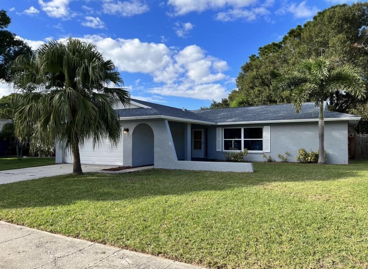 Very clean home located in the highly sought-after Woodgate III neighborhood! This spacious home offers a large primary bedroom with attached en suite, newer windows, attached 2 car garage, an interior laundry room with washer and dryer hook-ups and porcelain tile through-out. Enjoy an evening in the nice enclosed back patio overlooking the large fully fenced in backyard with ample privacy. Close proximity to Downtown Dunedin, Safety Harbor, Countryside Westfield Mall and several shopping centers, restaurants and grocery stores. Only a short drive to Downtown Tampa & St. Pete, Nightlife, 2 International Airports and Award winning beaches! Schedule your showing today!