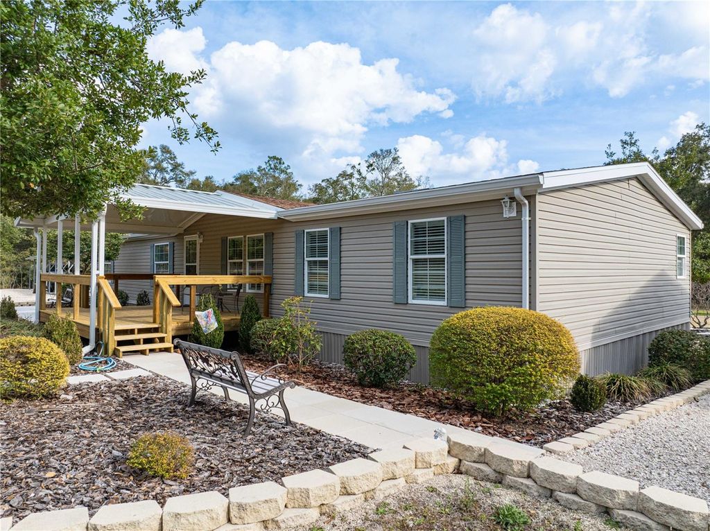 Photo of 9972 SW County Road 240, Lake City, FL 32024 (MLS # O6384658)