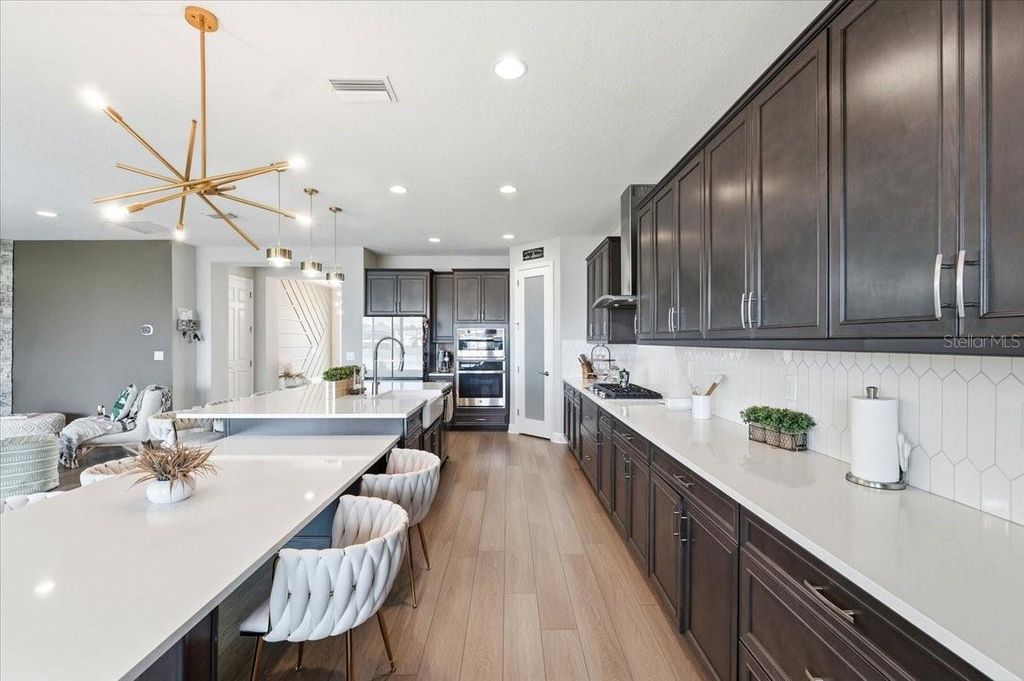 Photo of 14508 Woodland Spur Dr, Lithia, FL 33547 (MLS # O6382193)