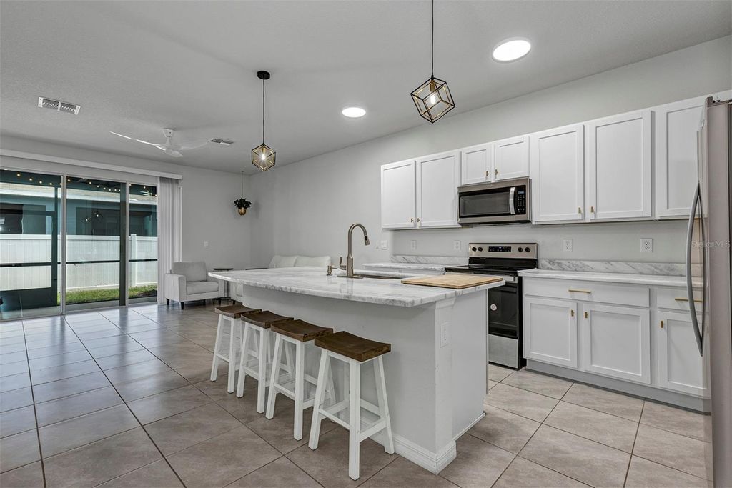 Photo of 4015 Blue Banks Lane, Bradenton, FL 34208 (MLS # O6395074)