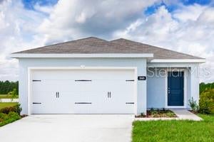 Photo of 11490 SE 77th Avenue, Belleview, FL 34420 (MLS # W7886698)