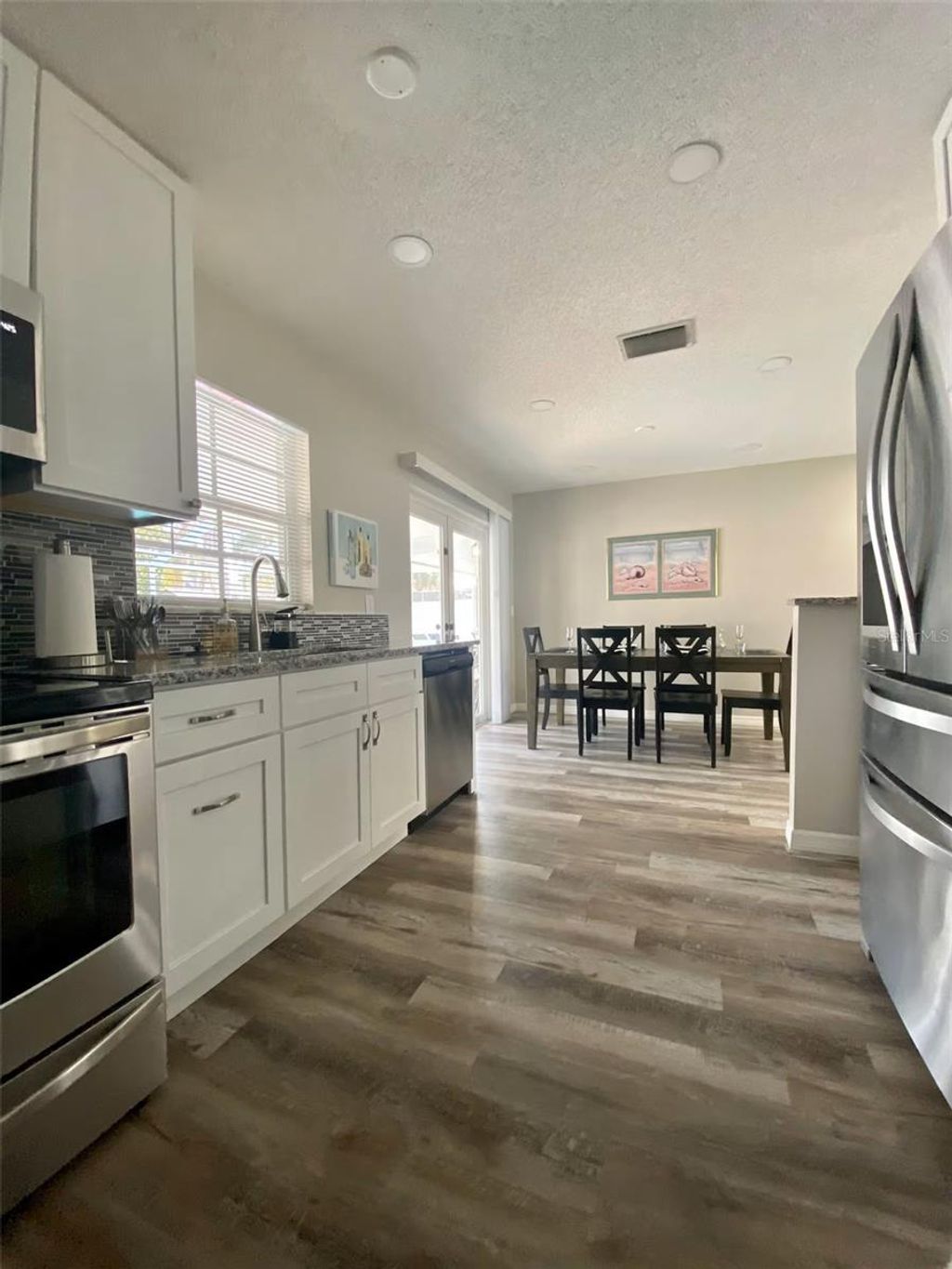 Photo of 8024 Candlewoode Drive, Largo, FL 33773 (MLS # TB8456378)