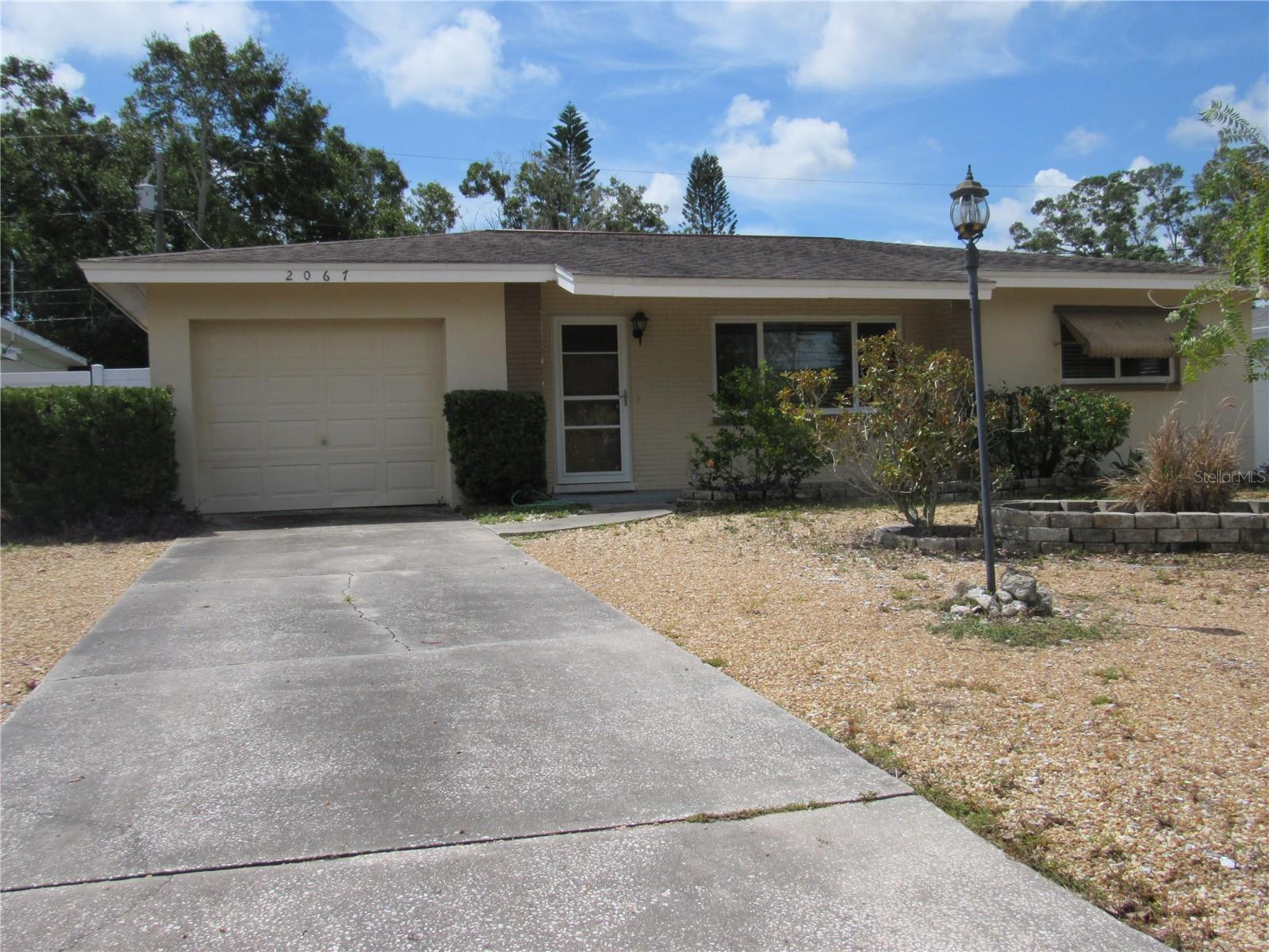 Located in the peaceful neighborhood of Greenbriar, this charming 2 bedroom 1 bathroom is available for rent. Enjoy modern laminate flooring throughout, a well appointed kitchen with stainless-steel appliances, and an open floor plan. Both bedrooms are a generous size and there is additional storage closets as well as garage storage. Washer and dryer hookups in the oversized one car garage. Unwind outside on the spacious paver lanai or let your furry friend roam in the fenced backyard. The neighborhood offers a community pool, fitness and recreational center. Ideal location for access to Clearwater beach, shopping, medical, dining, and major commuter routes. Contact us today to schedule a tour!