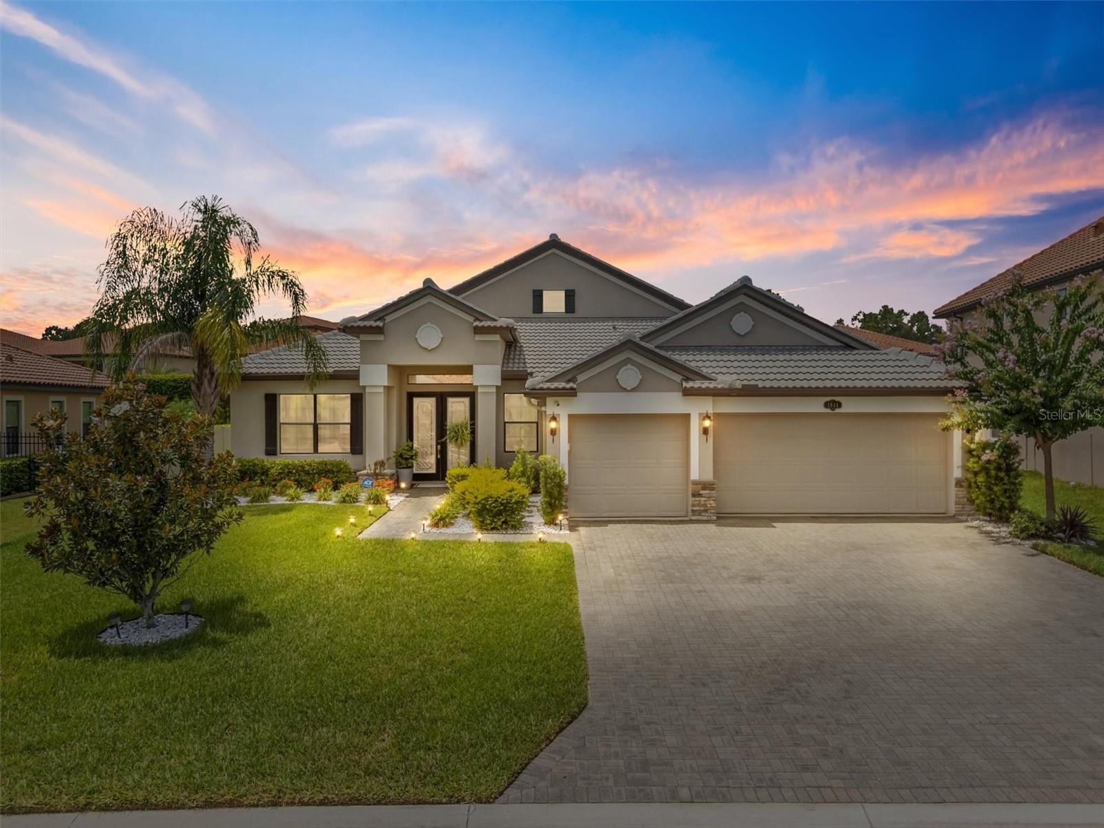 Welcome to your Mediterranean style dream home in sunny central Florida, which is in the sought after gated resort style community, Terra Largo. In this stunning 5-bedroom, 4-bathroom pool home nothing has been spared and offers the perfect blend of luxury, comfort, and privacy. Step inside to discover a beautifully updated kitchen featuring sleek quartz countertops, new backsplash, and all new and stainless steel appliances updated in (2021)— ideal for everyday living and entertaining and a walk-pantry perfect for any home chef. Throughout you'll find elegant new wood floors and upgraded baseboards all on the main floors and stairs, adding warmth and style. Enjoy the charm of custom wall features in the den/office and living room, adding character to the main living spaces. Have peace of mind with a new roof (2023), gutters (2024) new 3.5-ton A/C (2023), gutters, and freshly sealed pavers that add to the home's curb appeal and have a 1 year warranty good until 7/23/26. The large master bedroom is a true retreat, featuring his and hers walk-in custom closets (2022) with spa like en-suite bath. Upstairs, you'll find a spacious bonus area with its own private bath—ideal for a playroom, home gym, or second master suite. Relax and unwind in your private backyard oasis complete with a sparkling pool and jacuzzi, surrounded by custom landscaping (2024) that creates a tranquil escape. The 3-car garage for ample storage. As part of the exclusive Terra Largo neighborhood, you'll have access to amazing amenities, including a beautifully maintained clubhouse with a zero-depth entry pool, spa/hot-tub, state-of-the-art fitness center, tennis/basketball courts, gazebo, rental party room, covered playground, and lush landscaping. Located just minutes from shopping, dining, and I-4 access with just a short drive to Disney World and theme parks, and Tampa beaches. Whether you're looking for a family home, vacation getaway, or investment property, this gem offers the perfect combination of location, luxury, and lifestyle. VA loan is assumable! This home is truly move-in ready, with all major big-ticket items already taken care of. schedule your private showing today!