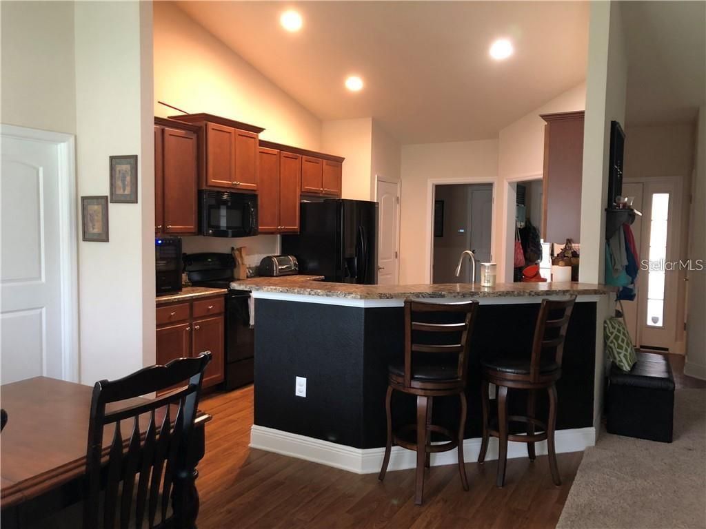 Photo of 7110 Remington Oaks Loop, Lakeland, FL 33810 (MLS # L4961403)