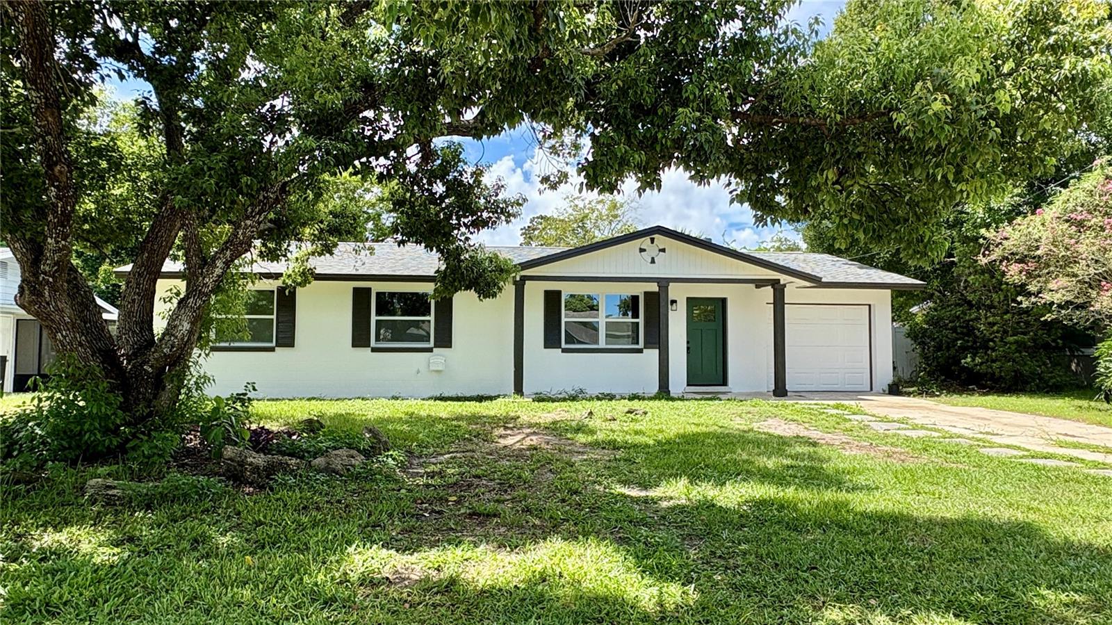 Don't miss your opportunity to own this remodeled 3 bedroom, 2 bath home. The modern kitchen offers shaker style cabinets, gorgeous counters, and stainless-steel appliances. When night falls, there's room for the whole family here with 2 guest bedrooms, a guest bath and a Master bedroom offering an ensuite bath. This great home also offers an attached 1-car garage with laundry hookups, a fenced yard offering the perfect place for a garden, or a game of catch with the kiddos or fetch with Fido and a large shed to store your beach gear and garden tools. This home is in a central location, near the Daytona International Speedway, top shopping spots, restaurants, entertainment options, and the beach. It's also situated near I-95 and I-4, offering easy access to popular hotspot destinations like historic St. Augustine, the space coast, and the world-famous amusement parks of Orlando. Schedule your show today and this property could soon be YOURS!
