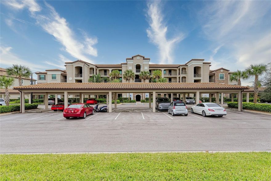 RESORT STYLE LIVING! LAKEWOOD NATIONAL GOLF & COUNTRY CLUB has everything, TWO Arnold Palmer designed golf courses, Resort Style Amenity Center with Zero Entry Pool,Fitness, Tennis, Boccie Ball, Pickle ball, Spa, Tiki Bar, Dinning Room, to enjoy with fantastic neighbors. This 2 BEDROOM +DEN, 2 BATH 2ND FLOOR END UNIT , TURNKEY FURNISHED , has 3 way lakes and golf course views with great privacy. Large upgraded kitchen with breakfast nook, dinning area, living room . Master Bedroom & bath, and walk in closets, 2nd bedroom with full bathroom ,plus Den with pocket doors that can be used as an additional bedroom. There is a storage area just outside the unit to store golf clubs, etc. Assigned carport and a plenty of visitor's parking spaces. Close to Main Street at Lakewood Ranch/ UTC Mall , #1 Siesta Key Beach and other Beaches as well....