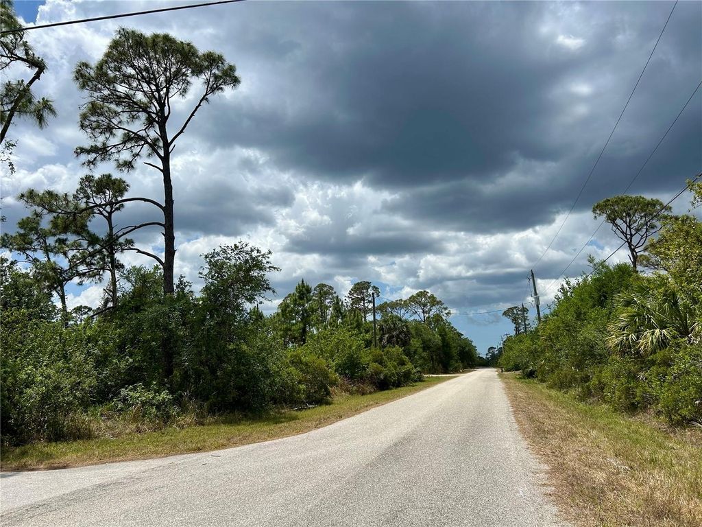Photo of 18055 Sicily Ave, Port Charlotte, FL 33948 (MLS # C7509272)