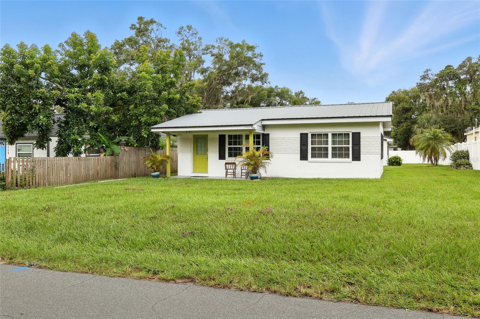 Charming Florida Bungalow with DETACHED Private Guest Cottage — Your Retreat in Zephyrhills—perfect for move-in-ready convenience,
seasonal enjoyment, or perhaps an investment! Originally built in 1959, this lovingly maintained 2-bedroom, 1-bath bungalow exudes cozy charm its 936 sq ft of comfortable living space in the main house with 2 bedrooms/1bath and a CUTE as a button GUEST COTTAGE featuring a kitchenette, full bathroom, sitting area, and its very own washer and dryer. The heart of the main home lies in its kitchen and great room, each updated with ceiling fans and light fixtures to keep the atmosphere light and breezy. Just beyond the kitchen is a fully enclosed Florida room adorned with wainscoting and a warm wood-plank ceiling—a perfect spot for morning coffee or evening chats. Both the main house and cottage have a metal roof, there’s been so many thoughtful touches done to this home! Outside is a comfortable sized lot with alley access in the back. Everything here is already done for you, ready for effortless living—whether you're a seasonal visitor looking for an escape or seeking a forever-home the opportunities are limitless. Close to historic Downtown Zephyrhills that hosts fun events year-round! Convenient to dining, shopping, and entertainment.