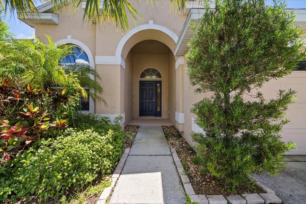 Photo of 1833 Mira Lago Circle, Ruskin, FL 33570 (MLS # TB8545016)