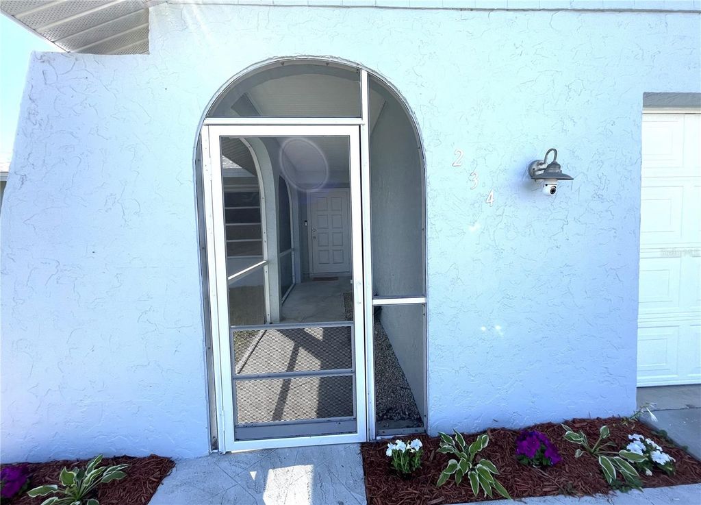 Photo of 234 Shadow Street NW, Port Charlotte, FL 33952 (MLS # C7518430)