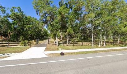 ?? Property Grounds & Landscape Highlights
Expansive, Gated Entry: A welcoming gate at Fort Hamer Road opens to a long private driveway that extends deep into the property, offering both privacy and scenic access throughout the full 4.3 acres.
Mature Canopy & Natural Setting: The property is richly wooded, with large, established shade trees including live oaks and palms, giving the land a serene, park-like ambiance. The combination of open grassy areas and wooded groves provides both beauty and seclusion—ideal for personal enjoyment or outdoor activities.
Topography & Drainage: While detailed elevation info isn’t publicly available, neighboring parcels along Fort Hamer Road often feature gently rolling terrain and mixed woodland/open fields, which support natural drainage and diverse vegetation patterns
nextdoor.com
+10
Homes.com
+10
Redfin
+10
.
Privacy & Buffer Zone: With approximately 250 feet of road frontage, the property benefits from a substantial setback and dense vegetation along its perimeter, enhancing its sense of seclusion
LoopNet
.
Driveway & Access: The driveway’s full-length layout suggests ample vehicular access to the rear of the lot, suitable for additional buildings, equipment, or future development. It also underscores ease of access for multiple uses—from adults and vehicles to potential farm or utility needs.
?? Landscaping & Use Potential
This property’s landscaping and layout offer versatility:
Ideal for Natural Retreats: The mix of mature tree cover and open spaces offers a tranquil setting for retreats, creative landscaping, or simply enjoying nature from private vantage points.
Equestrian, Hobby Farming, or Gardens: The flat-to-gently rolling terrain and tree-shaded parcels create flexible zones—perfect for horse paddocks, small-scale gardening, or leisurely outdoor installations.
Expansion & Development Opportunities: The existing driveway and open corridors lend themselves to future additions like barns, guest homes, or workshop buildings (subject to local zoning allowances).
?? Summary Table
Feature Details
Lot Size ~4.3 acres
Access Gated entrance off Fort Hamer Rd; long driveway to rear
Vegetation Mature live oaks, palms, wooded cover with open grassy areas
Terrain Gentle rolling mixed with wooded buffer
Privacy Dense perimeter vegetation and front setback
Potential Uses Retreat, hobby farming, equestrian, future expansions
? Overall Impression
A rare mix of privacy, character, and accessibility, this 4.3-acre parcel at Fort Hamer Road stands out with its gated frontage, tree-canopied lanes, and generous acreage. Whether envisioned as a peaceful homestead, agricultural retreat, or future build site, the land delivers strong appeal rooted in mature landscape and natural structure.
If you're considering landscape design, zoning research, or imagery like aerial/drone shots to plan enhancements—or just want help layering ideas—let me know—I can help guide you further!
~Buyer's Agent Respected~
