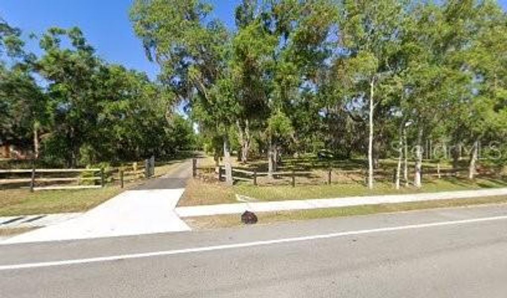 Photo of 4705 Fort Hammer Rd, Parrish, FL 34219 (MLS # A4660543)