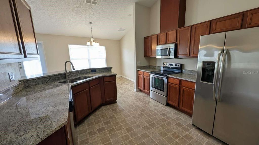 Photo of 331 Grouper Drive, Poinciana, FL 34759 (MLS # TB8434923)