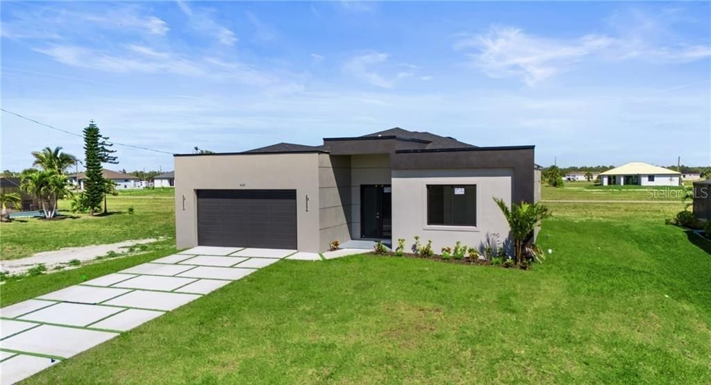 Photo of 3927 NW 40th Terrace, Cape Coral, FL 33993 (MLS # O6387797)