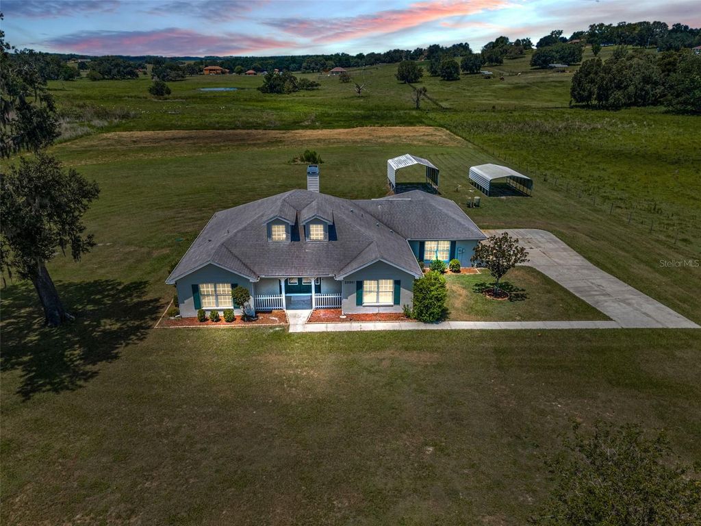 Photo of 20901 Highpond Lane, Dade City, FL 33523 (MLS # W7877934)