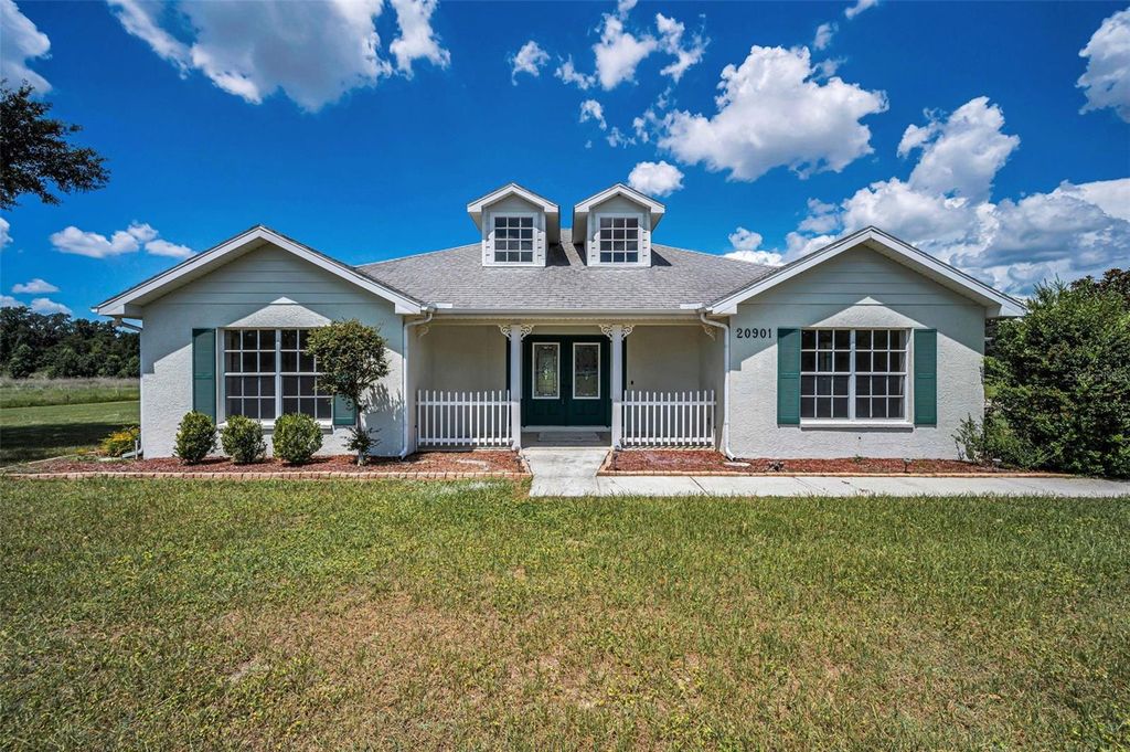 Photo of 20901 Highpond Lane, Dade City, FL 33523 (MLS # W7877934)