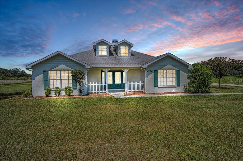 Photo of 20901 Highpond Lane, Dade City, FL 33523 (MLS # W7877934)