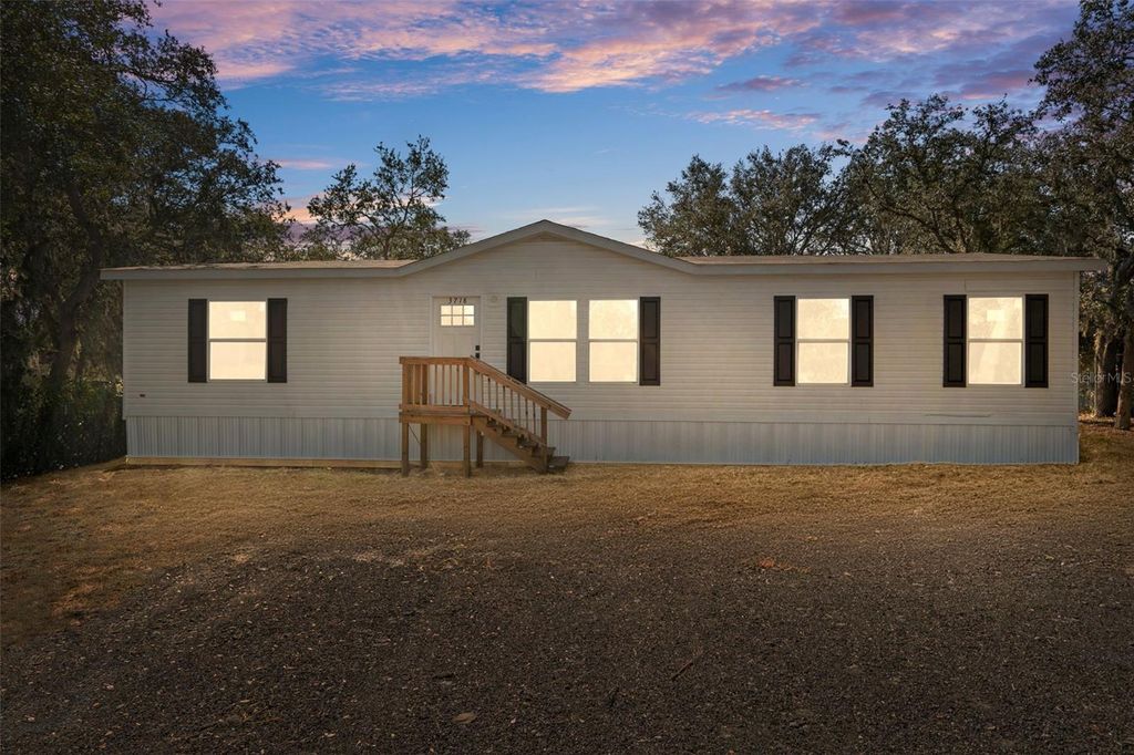 Photo of 3718 Shetland Drive, Lake Wales, FL 33898 (MLS # W7879992)