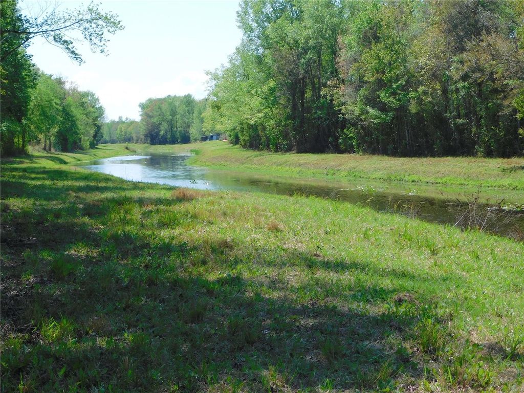 Photo of 10505 E Deep Creek Boulevard, Hastings, FL 32145 (MLS # O6390053)