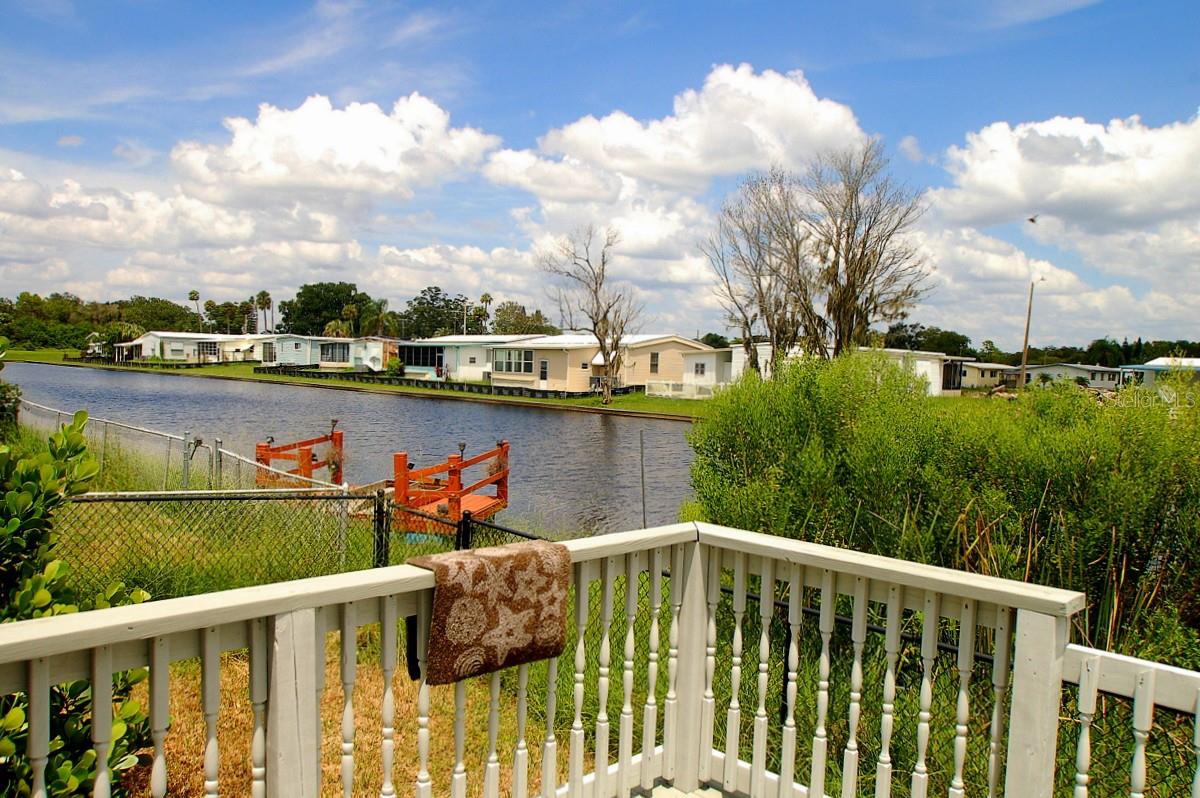 Calling All Investors... Don't let this waterfront opportunity pass you by! This RARE canal front lot sits on a secluded street. The canal leads to both the Cotee River and Gulf of Mexico. Property is ideally located just off the beaten path, yet near everything... PLUS there's NO HOA! A short drive away are countless shopping hubs as well as quaint downtown restaurants, pubs, shops and activities of New Port Richey. Current property has a gutted mobile home that is probably a tear down. The 50% rule applies so home will probably require more repairs than the City will allow. Value is in the LAND! Replace the current mobile home with a new one OR build a new home. Bring your boat and you're all set to enjoy fresh and saltwater fishing, as well as visit the local watering holes off the river. Possibilities are endless! You may walk the property but do NOT go in the home. CASH ONLY!
