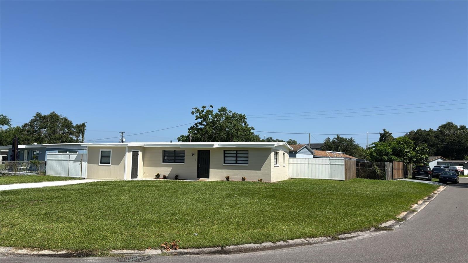 Modern Comfort Meets Smart Living – Remodeled 4-Bedroom Corner Lot Gem in Prime Tampa Location. Welcome to 2921 Sample Loop, a beautifully renovated 4-bedroom, 2-bath home nestled on a spacious corner lot in one of Tampa’s most convenient locations.
This move-in-ready property seamlessly blends modern upgrades, smart home features, and functional outdoor space. Recently Renovated with Designer Touches. Brand new roof. Fully remodeled kitchen and bathrooms. New quartz countertops and solid wood cabinetry throughout. Stainless steel appliance package in the kitchen. Waterproof luxury vinyl plank flooring for durability and style. Smart Home Technology for Peace of Mind & Efficiency: Nest video doorbell, Nest floodlight camera in the backyard, Google Nest thermostat for energy savings year-round. Spacious Lot with Room to Grow. Large corner lot with generous front and backyard. Ample space to add an efficient storage unit, garden, or entertaining area. Enjoy privacy, flexibility, and outdoor potential. Central location. Just minutes to Downtown Tampa, I-4, Crosstown Expressway, and I-75, Quick access to dining, shopping, parks, and major employers, NOT located in a flood zone – potentially save thousands annually on insurance. This home combines contemporary style with smart features and unbeatable location. Whether you're looking for your next home or a solid long-term investment, 2921 Sample Loop checks all the boxes.