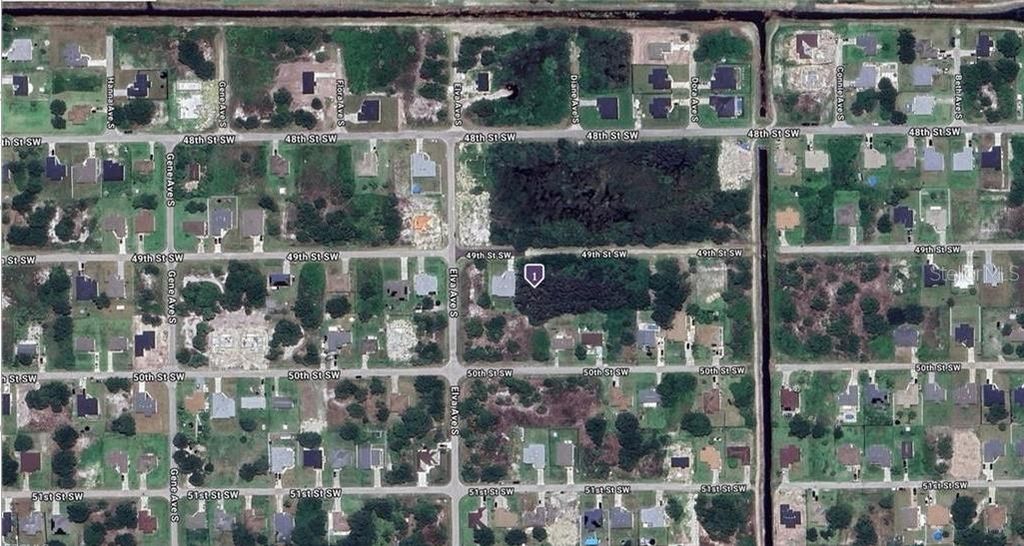 Photo of 2615 49th Street SW, Lehigh Acres, FL 33976 (MLS # A4669498)