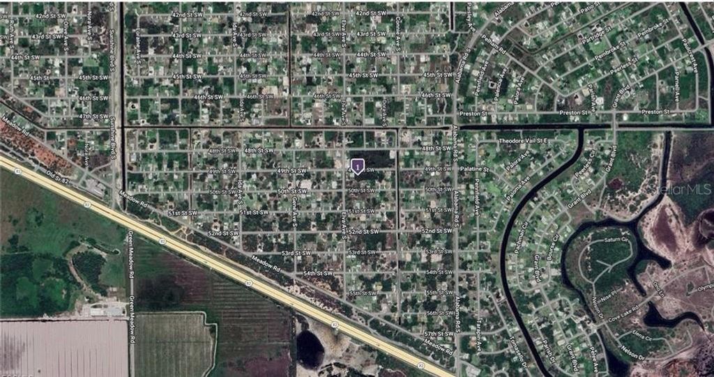 Photo of 2615 49th Street SW, Lehigh Acres, FL 33976 (MLS # A4669498)