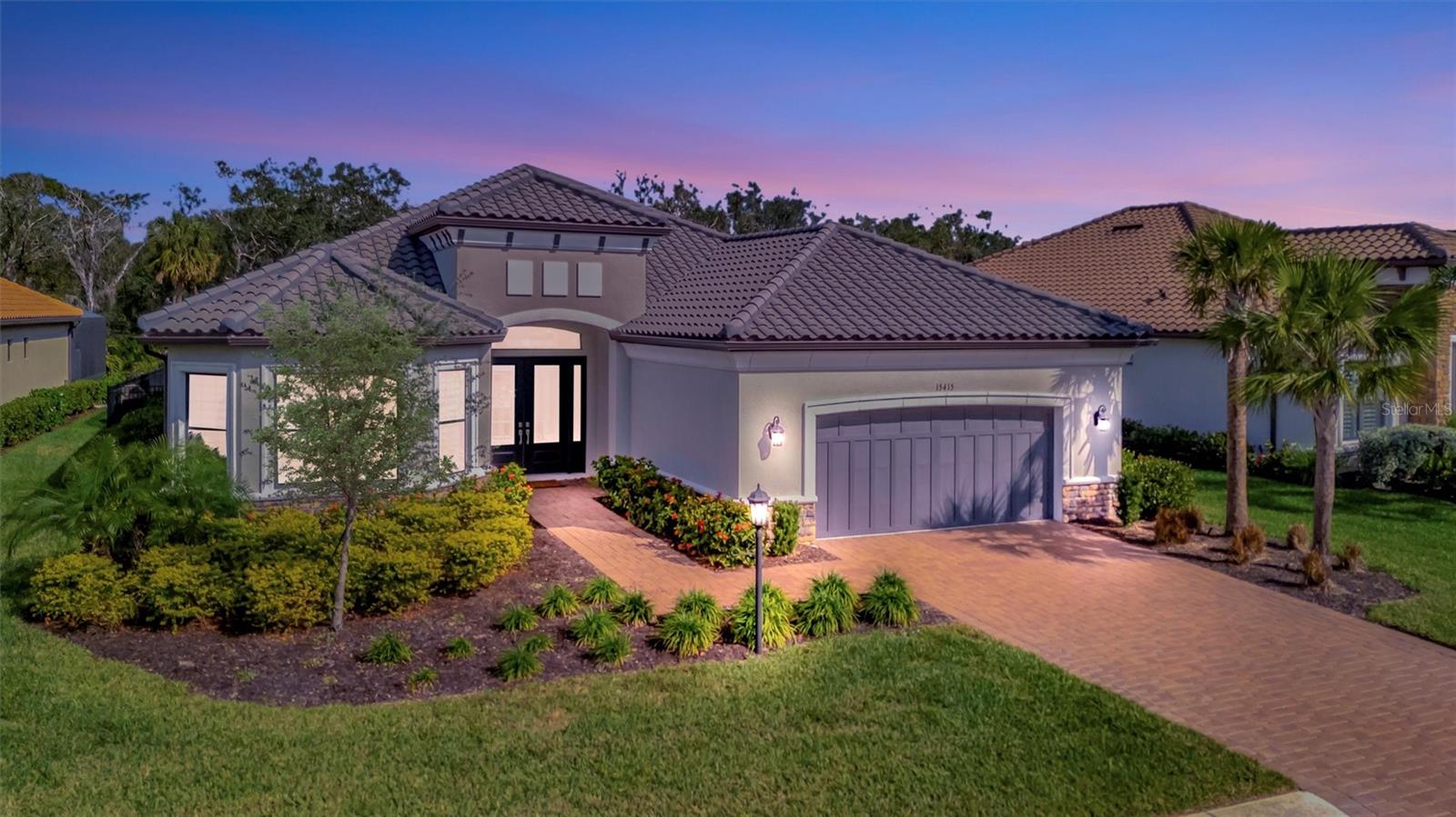 Florida luxury living at its finest! This stunning 3 bed/3 bath home is located on a conservation lot with a fenced back yard in the desirable community of Esplanade at Azario Lake offering a blend of comfort, style and luxury. This beautiful Palazzio model is situated in a tranquil neighborhood with easy access to the area’s vibrant amenities, making it ideal for seeking both convenience and serene living. This well-maintained gated community boasts a spacious, open-concept layout that is perfect for both family living and entertainment. As you enter the home, you are welcomed into a bright and airy foyer with soaring ceiling, large hurricane impact sliders and an abundance of natural light. The modern kitchen is a chef’s dream with top-of-the-line appliances, an extensive quartz island, gas cook top, walk-in pantry, and an abundance of storage making it ideal for meal preparation and entertainment. The home includes a luxurious master suite with a huge walk-in closet and en-suite bathroom with an amazing shower. All rooms are designed with high-end finishes, offering both functionality and style. The den offers additional space with flexible options such as an office or creative space for hobbies. The home also includes a high-end water treatment system and all lighting was upgraded after closing. The home’s extended lanai provides a perfect space for relaxation and entertainment. The lanai is plumbed for an outdoor kitchen and wired for TV making it ideal for outdoor activities and enjoying Florida’s beautiful weather. The backyard is perfect for adding a pool. Living in Esplanade at Azario Lake offers residents access to world-class amenities such as golf, pickleball, tennis, Bahama bar, resort style pool, and a culinary arts building offering on-site world class dining. This home is not just a place to live, but an exceptional lifestyle to experience.