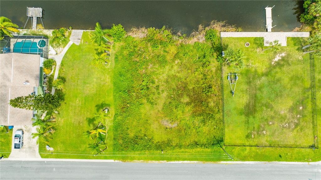 Photo of 3326 Fernleaf Drive, Hernando Beach, FL 34607 (MLS # U8252943)