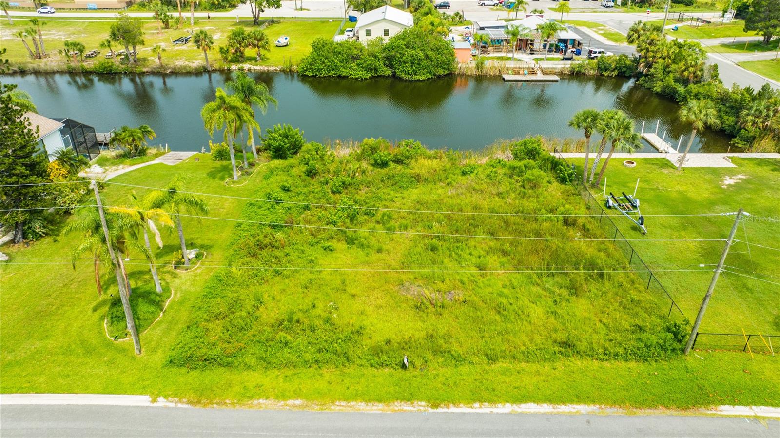 LOCATION - LOCATION - LOCATION!!! Build your custom dream home and enjoy the highly sought after beach & water lifestyles in Hernando Beach with the most stunning sunsets & ocean breezes, and a new day filled with endless possibilities. This isn’t just a lot..it’s a gateway to a life extraordinary. Boating made easy with access to the newly installed community Boat Lift. Fishing charters, close to many restaurants, and this is only the beginning. Surrounded by the Gulf of Mexico this isn’t just a place to live, it’s an adventure bringing you closer to your dreams . The smell in the ocean air will take you on a journey of tranquility and peace. Located on the Gulf of Mexico with a 3 acre beach where you can picnic, water ski, swim and just relax in the sun. In the winter, enjoy the migration of the majestic manatee’s as they enjoy the warm waters. Now is the time to build the home you have always wanted with all the amenities close by to experience the life that living on the water offers. You are ready to turn this dream into a reality…you deserve it…make your appointment today!
Survey needed to confirm lot size & dimensions.