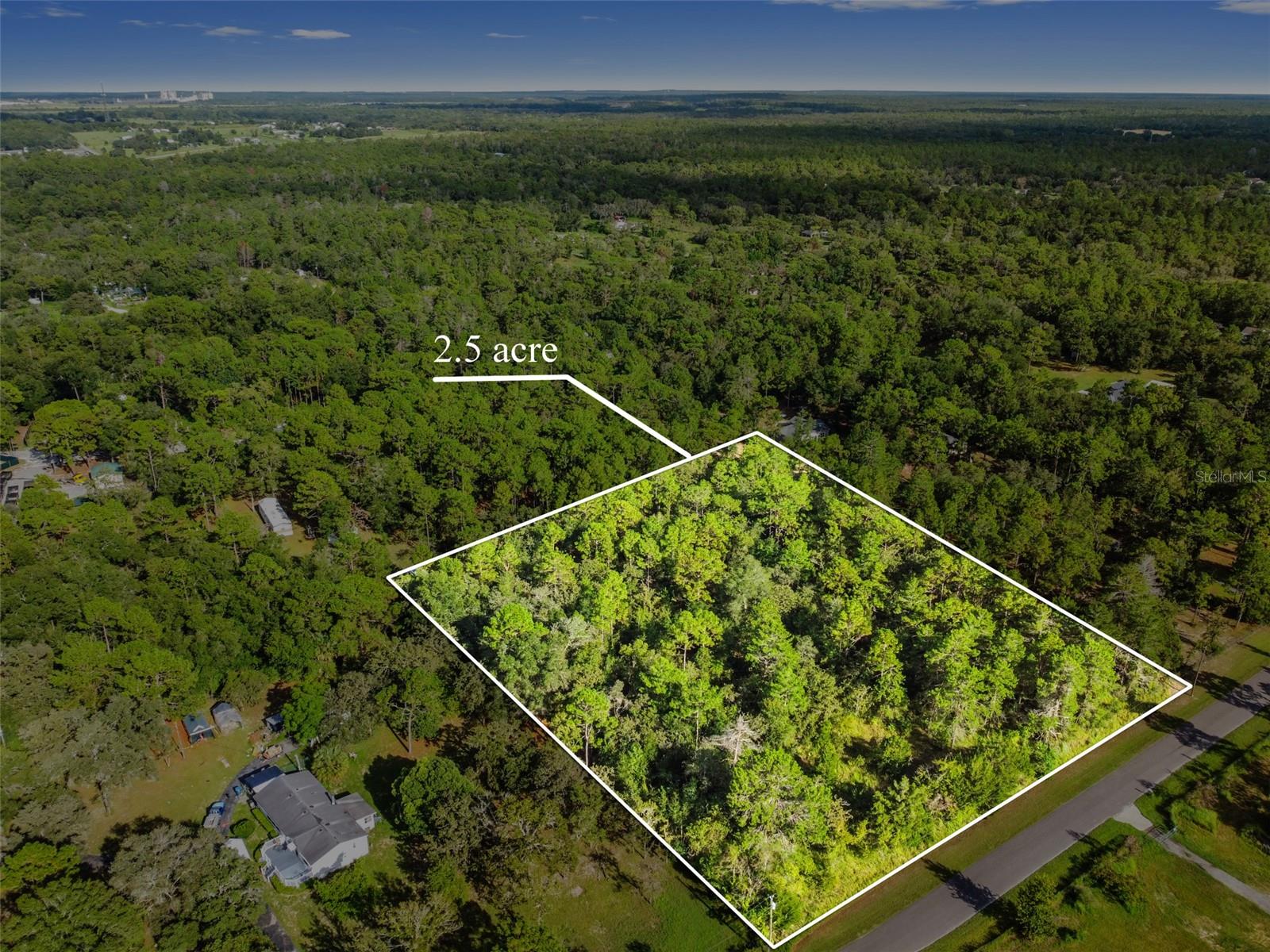 Discover 2.3 beautiful acres on a paved road, offering the perfect balance of privacy and convenience! This prime parcel is located just 5 minutes from shopping, dining, and everyday necessities, yet offers a serene rural setting ideal for your dream home, hobby farm, or private retreat. Surrounded by nature with plenty of space for animals, gardens, or future expansion, this property is a rare find. Need more room? A stunning 5-acre property with a 4-bedroom, 2-bath home is also available right next door, making this a fantastic opportunity to create your own private compound or family estate, Key#00103676!!