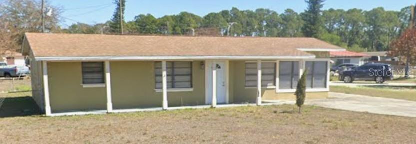 Photo of 2251 E 8th Street, Lehigh Acres, FL 33936 (MLS # O6451520)