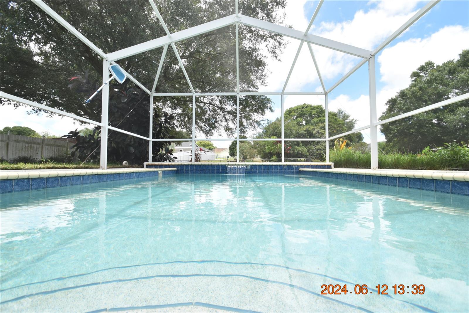 3 Bedroom 2 Bath POOL HOME in Zephyrills with 1104 sqft. of living space!
There is a $125 monthly pool service fee.
Screen-enclosed pool. is perfect for relaxing and enjoying the Florida weather!
HUGE yard with shaded, paved patio area, offers lots of room to roam.
Garage keeps your vehicle secure and out of the elements.
Freshly painted and ready for your finishing touches.
Luxury vinyl plank flooring is sure to accentuate your décor.
The kitchen has plenty of cabinet & counter space and pantry to keep things organized.
Kitchen appliances include range, refrigerator and dishwasher for the chef.
Master bedroom features a walk-in closet and full bath for privacy.
Efficient central AC and heat will keep you comfy year round.
Washer and dryer CONNECTIONS for your convenience.
Window blinds allow just the right amount of light.
Ceiling fans will be sending you a cool breeze.
Convenient to shopping, with groceries, retail, and restaurants near by.
Utilities are separate and tenant responsibility.
Lawn care is separate and tenant responsibility.
DONT FORGET TO CHECK OUT THE FULL WALKTHROUGH VIDEO AT OUR WEBSITE!!