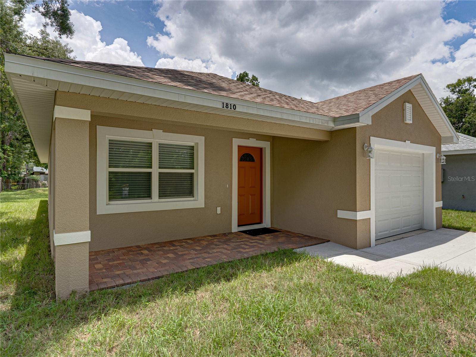 This newly built home is located in a quiet neighborhood. Beautifully designed three bedroom, two bath home with modern finishes and thoughtful touches throughout. The kitchen and bathrooms are styled with sleek granite countertops and stainless appliances, offering both beauty and functionality. Both bathrooms feature tasteful tiled surrounds. Kitchen and living area are finished with gorgeous, easy to maintain, tile flooring that adds warmth and style in a spacious layout. One car spacious garage with epoxy paint floor. You don't want to miss out on this quality craftsmanship, comfort and convenience.