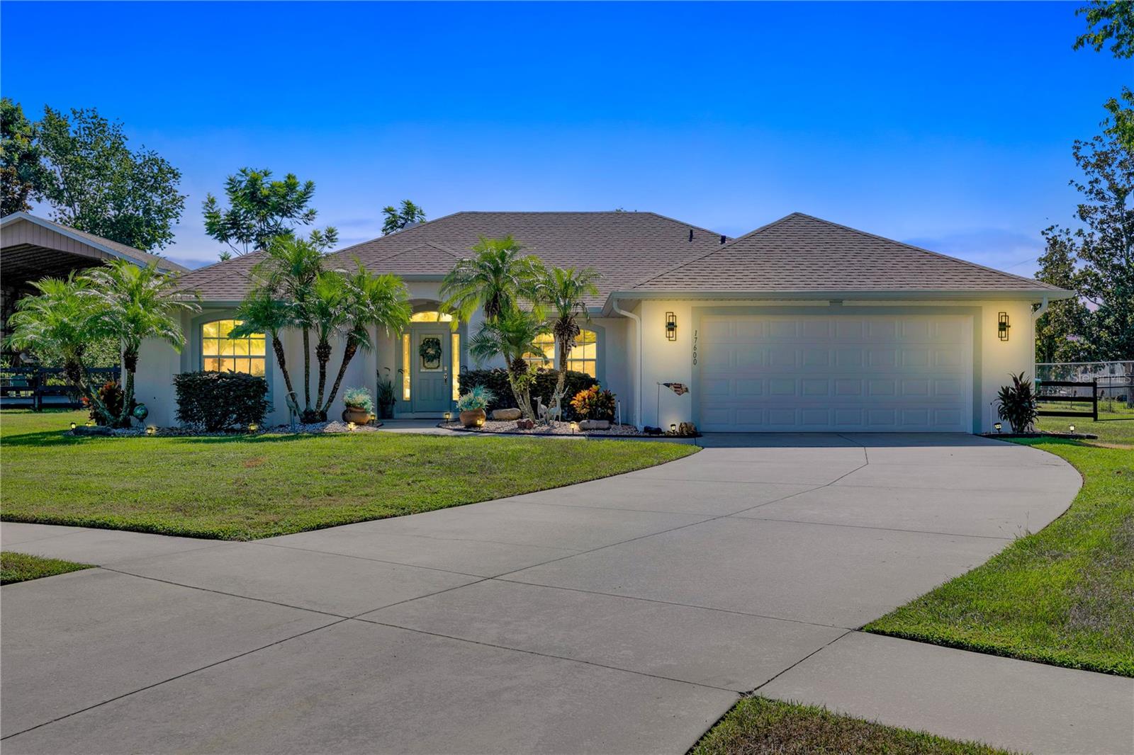 Quiet cul-de-sac location in the much sought after Pines of Montverde community. Located less than 1 mile from Montverde Academy. Well Maintained half acre lot at end of cul-de-sac. Completely remodeled 3 Bedroom / 2 Bathroom home. Open floor plan with Brick fireplace and split bedrooms. Built in 2003. New everything -- new roof, new A/C system, new hot water heater, new refrigerator, new garage door opener, new exterior lighting. Septic System recently pumped. Freshly painted inside and outside. Updated gourmet kitchen with beautiful granite countertops, soft close drawers and cabinets, and walk-in pantry. Master Suite is spacious with two walk-in closets, bathroom with large tub and huge walk-in shower. Two other bedrooms in the split plan share the second bathroom. Laundry Room has upper and lower cabinets and a deep utility sink that leads to the two car garage. Double sized, covered, screened-in porch with attached stone patio. Porch features four brand new ceiling fans/lights. Very large, fenced back yard. Two car garage with finished floor and pull down stairs for attic access. Located just a short drive from Downtown Montverde, enjoy easy access to local parks, tennis courts, eateries, and the towns beloved ice cream and BBQ spot. Montverde is celebrating its Centenial in 2025. The renowned Montverde Academy is just five minutes away. Call today to schedule your private showing!