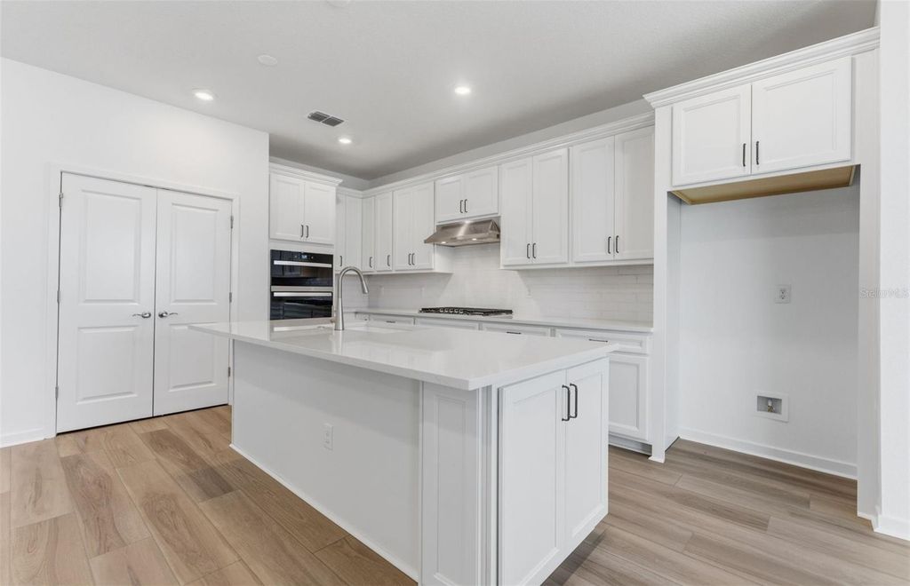 Photo of 6979 Depue Drive, Wesley Chapel, FL 33545 (MLS # TB8469630)