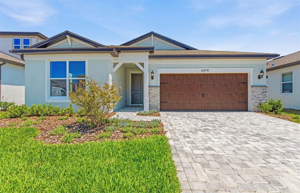 Photo of 6979 Depue Drive, Wesley Chapel, FL 33545 (MLS # TB8469630)
