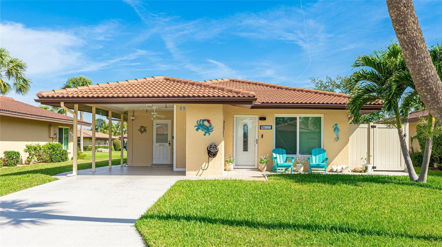 Discover refined living in this impeccably renovated villa, nestled in the highly desirable community of Cambridge Village. Offering a seamless blend of modern luxury and timeless charm, this move-in ready residence has been thoughtfully updated from top to bottom.

Upon entry, you’ll be welcomed by brand new luxury vinyl plank flooring and a freshly repainted interior, setting a light, comfortable tone throughout the home. The kitchen and bathrooms feature striking custom tile backsplashes and showers, adding elegant designer touches to the heart of the villa.

Significant mechanical updates ensure comfort and efficiency, including a new air conditioning system and hot water heater installed in 2021. In 2023, a brand-new roof was added, the driveway was professionally resealed, and new hurricane-rated windows were installed, offering both enhanced safety and energy savings.

Modern conveniences abound; new light fixtures throughout the home provide stylish illumination, while a Blink security system (installed but not yet connected) offers peace of mind for the future. Built-in surround sound ceiling speakers are in place and simply await your chosen receiver. For added luxury, remote-control blinds—installed in 2025—make adjusting the light effortless at the touch of a button.

The outdoor spaces are equally inviting. Enjoy serene views of the lush, tree-lined common area and picturesque grassy area from the back of the home—an ideal setting for quiet mornings or evening relaxation. A private patio on the side of the villa offers a perfect spot for outdoor dining or entertaining, while the backyard presents an exciting opportunity to design and build the patio of your dreams.

This villa offers an extraordinary combination of beauty, functionality, and peace of mind. With every major update already completed, it’s ready for you to simply move in and start enjoying the exceptional Cambridge Village lifestyle.