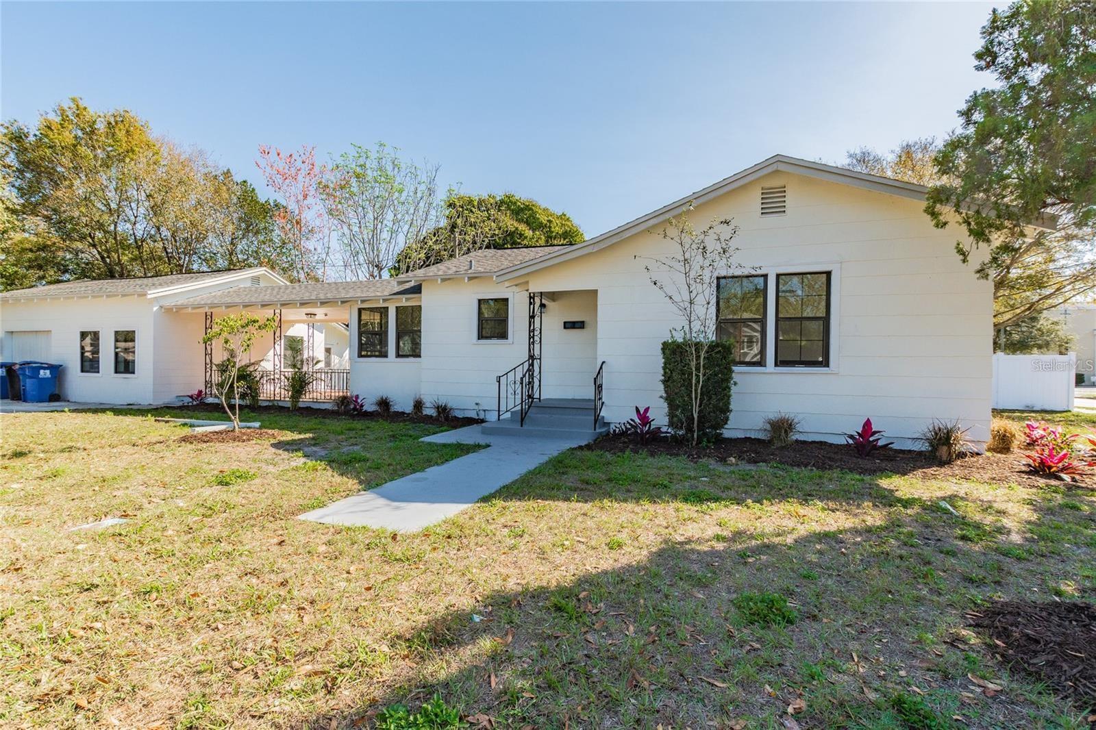 BEAUTIFULLY RENOVATED 2BR+1BA bungalow in coveted WOODLAWN / MAGNOLIA HEIGHTS neighborhood - easily walk or ride your bike to BEAUTIFUL CRESCENT LAKE. This home has been newly renovated including ALL NEW ENERGY-EFFICIENT WINDOWS, NEW AC, NEW ROOF, ALL NEW KITCHEN, NEW LAUNDRY including washer and dryer, NEW STAINLESS STEEL APPLIANCES, NEWLY REFINISHED hardwood floors, NEWLY PAINTED inside and out, ALL NEW BLINDS, and much more! This home has a large OPEN-CONCEPT living/kitchen/dining with tons of windows and natural light, and a large attached COVERED PATIO that opens to a FULLY FENCED YARD. There is also a new inside laundry with full size washer and dryer and additional storage space. The bathroom has a NEW VANITY with MARBLE counter-top and extra storage. BOTH BEDROOMS are large enough for a KING BED and LARGE CLOSETS. The BEAUTIFUL NEW OPEN-CONCEPT KITCHEN is in the middle of the home and has an ABUNDANCE of natural light, tons of cabinet space, ALL NEW STAINLESS STEEL APPLIANCES, and an EAT-IN BAR that connects to the living room. Enjoy all the MODERN CONVENIENCES of a FULLY RENOVATED newer home with all the CHARM OF A HISTORIC BUNGALOW! OWNER PAYS FOR WATER/SEWER/TRASH, WASHER+DRYER, LAWN MAINTENANCE, and PROFESSIONAL 24/7 PROPERTY MANAGEMENT! Don't miss this opportunity to live in the heart of WOODLAWN / MAGNOLIA HEIGHTS in a beautiful modern bungalow with all the modern conveniences! APPLICATION INFO: There are NO APPLICATION FEES, NO ADDITIONAL PET FEES, NO ADDITIONAL PET RENT, and we generally only require a ONE-MONTH SECURITY DEPOSIT (last-month's rent is generally not required) - We want to find a GREAT TENANT/CUSTOMER and we treat our tenants like CUSTOMER'S!