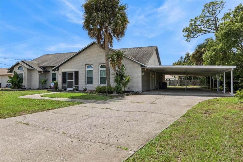 Photo of 2504 Glenwood Drive, Edgewater, FL 32141 (MLS # O6436350)