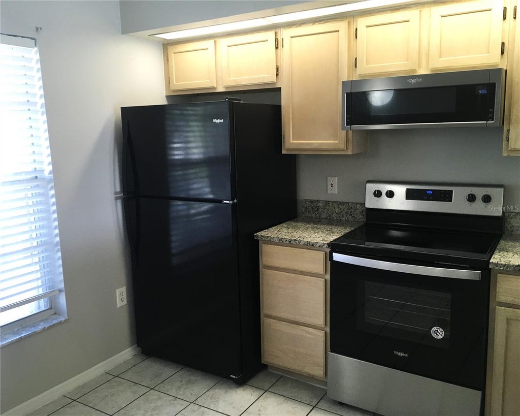 Photo of 13864 Timberbrooke Drive #202, Orlando, FL 32824 (MLS # O6449411)