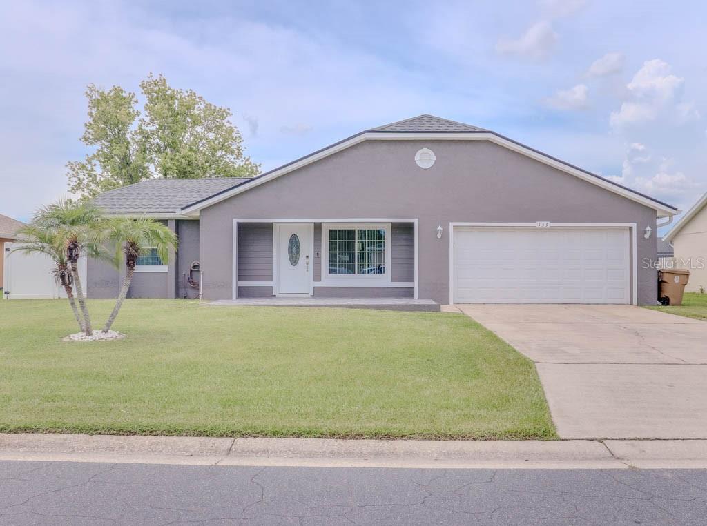Welcome to 133 Hollyhock Ct in Kissimmee, a fantastic opportunity for first-time homebuyers or investors seeking a move-in ready home with no HOA. This charming 2-bedroom, 2-bath property has been thoughtfully updated and offers exceptional value in a prime Central Florida location. Major improvements include a new roof installed in 2020 and new windows added in 2022, both with transferable warranties for added peace of mind. The home also comes partially furnished, featuring two bedframes, TVs in each bedroom, an impressive 86-inch TV in the living room, comfortable sofas, and all major appliances including a washer and dryer, making your move-in seamless from day one.
Enjoy the privacy of a fully fenced backyard, a spacious 2-car garage, and the freedom of no HOA restrictions. Located on a quiet street in a well-established neighborhood, this home is just minutes from schools, shopping, restaurants, and major highways, with a short drive to Disney and other world-famous attractions. Whether you're looking for a comfortable place to call home or a turnkey rental property, this home checks all the boxes. Don’t miss out on this incredible opportunity! Call to scheduale your showing today!