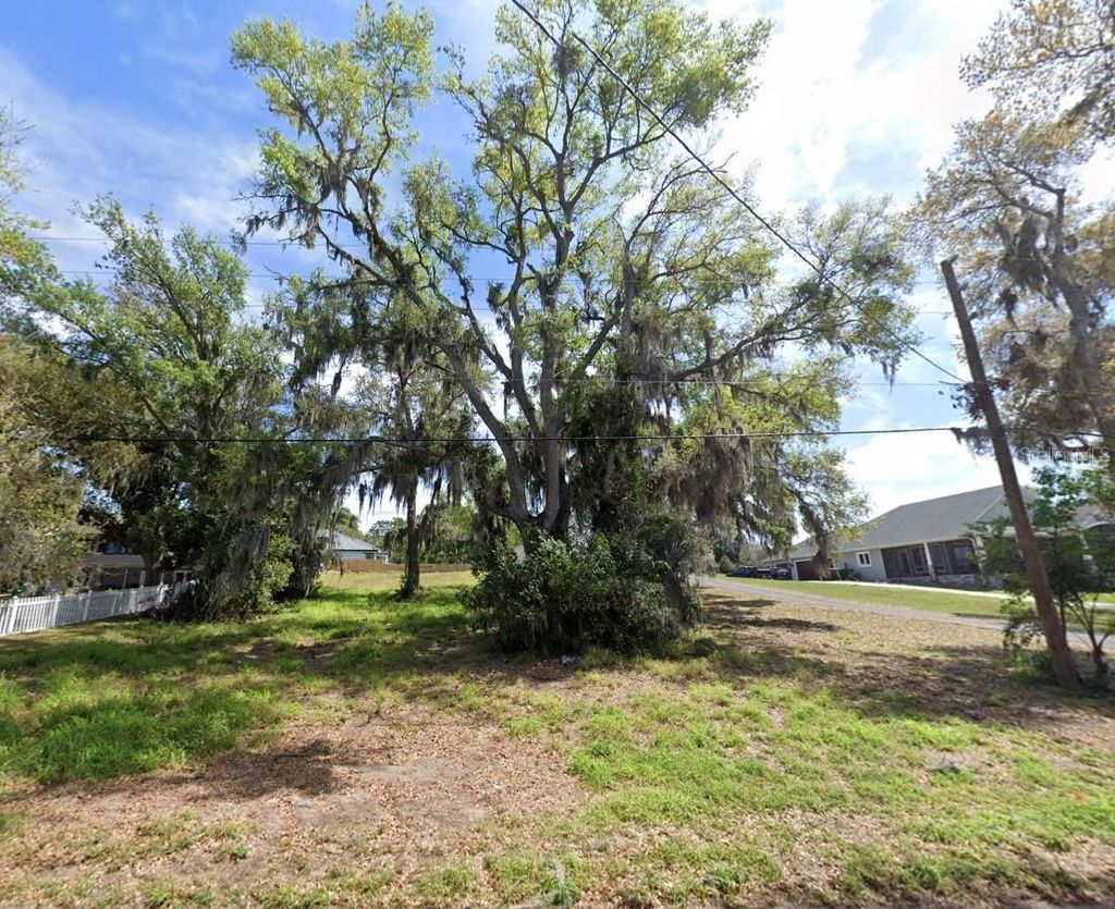 Photo of 12600 Lakeshore Drive, Clermont, FL 34711 (MLS # O6399663)