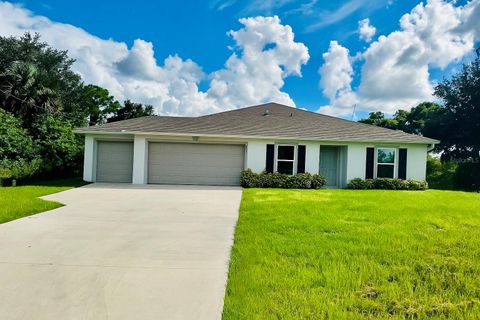 Photo of 3319 40th Street W, Lehigh Acres, FL 33971 (MLS # C7515400)