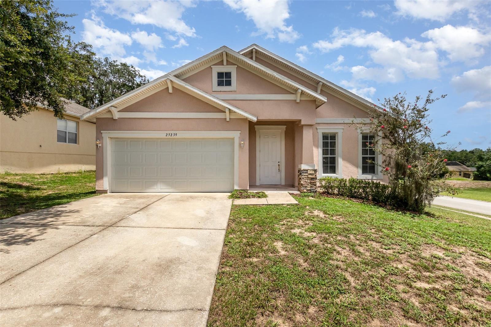 Well-maintained one-story home featuring a 3/2 layout, a two-car garage, and a large backyard, all situated on a spacious corner lot. The home offers comfortable living with great curb appeal and outdoor space. Ideal for buyers seeking a move-in ready property with room to enjoy both inside and out.