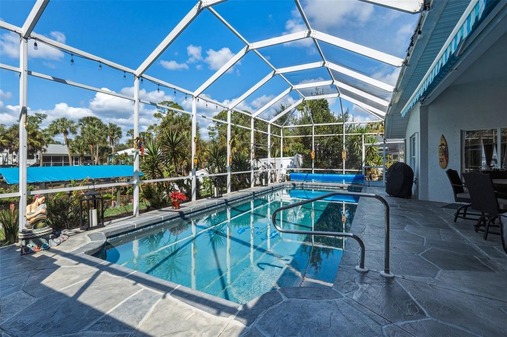 Photo of 2115 Cannolot Boulevard, Port Charlotte, FL 33948 (MLS # TB8484128)